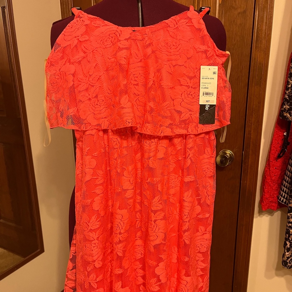 2 dresses available. One coral. One navy. Spaghetti strap, knee-length